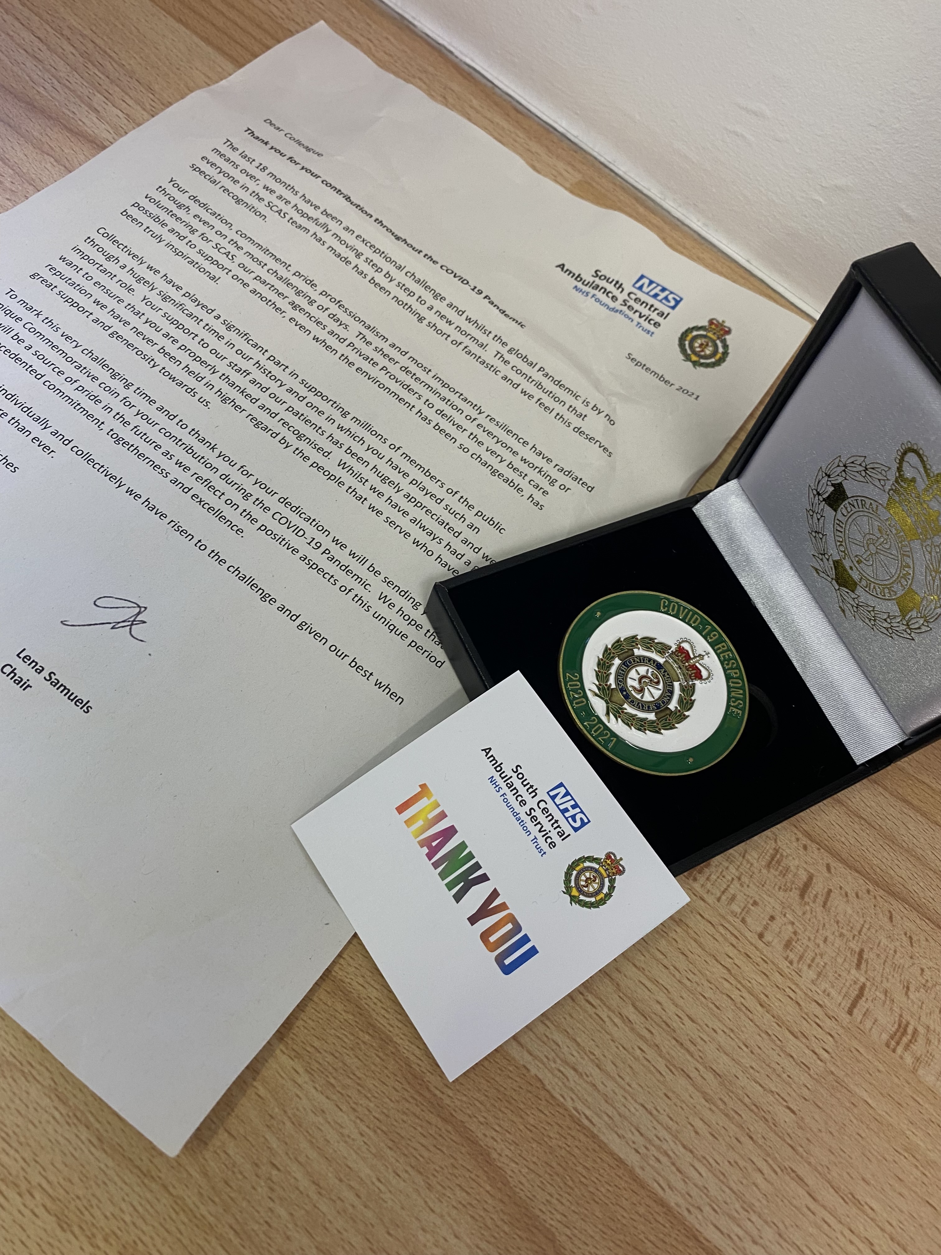 badge and letter
